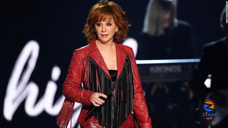 Reba McEntire has to be rescued from a second-story window after stairs collapse in historic building in Atoka, Oklahoma