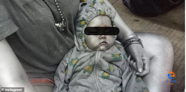 Beggar ‘borrows’ a baby from their mother for $2 and paints them silver in Indonesia