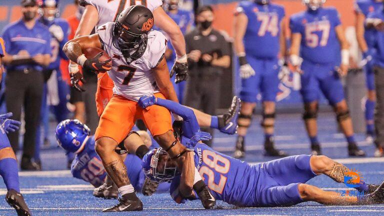 Jaylen Warren’s 218 rushing yards lead Oklahoma State to 21-20 win over Boise State