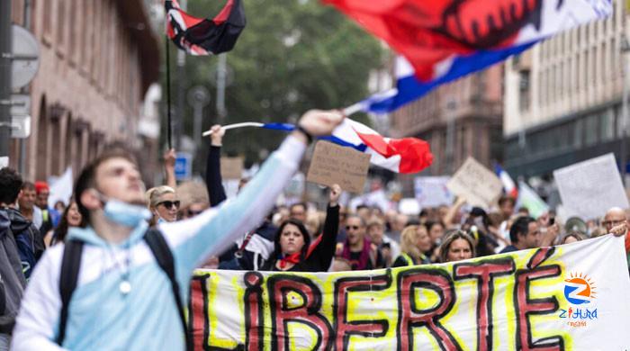 Thousands protest against mandatory Covid-19 health pass in France