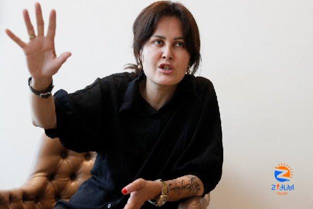 Woman film director who fled Afghanistan urges world to push Taliban to accept some conditions of democratic society