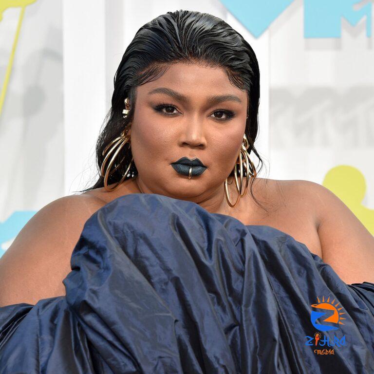 Lizzo Sends Poet Aurielle Marie Her AMAs Dress to Wear to Out100 Gala