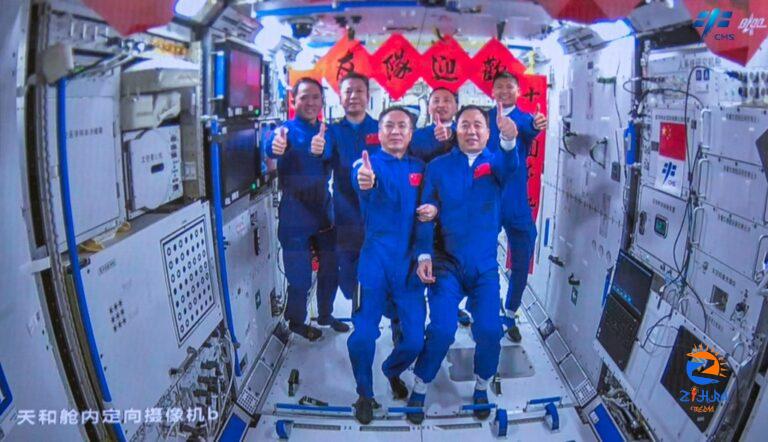 Chinese mission with first civilian reaches space station