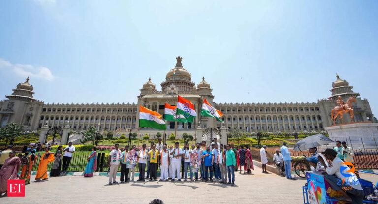 Congress workers sprinkle cow urine to ‘purify’ Karnataka Assembly before first session