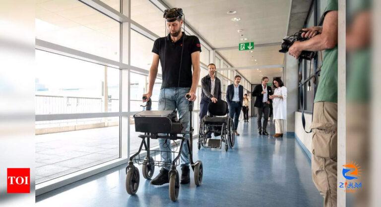 Paralysed man walks again via thought-controlled implants