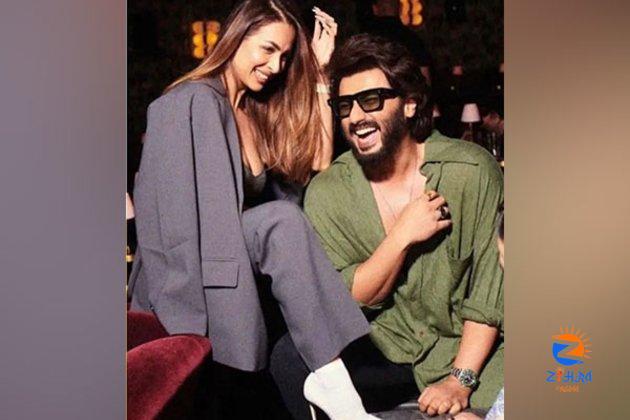 Malaika Arora shares Arjun Kapoor’s almost bare body photo, netizens react